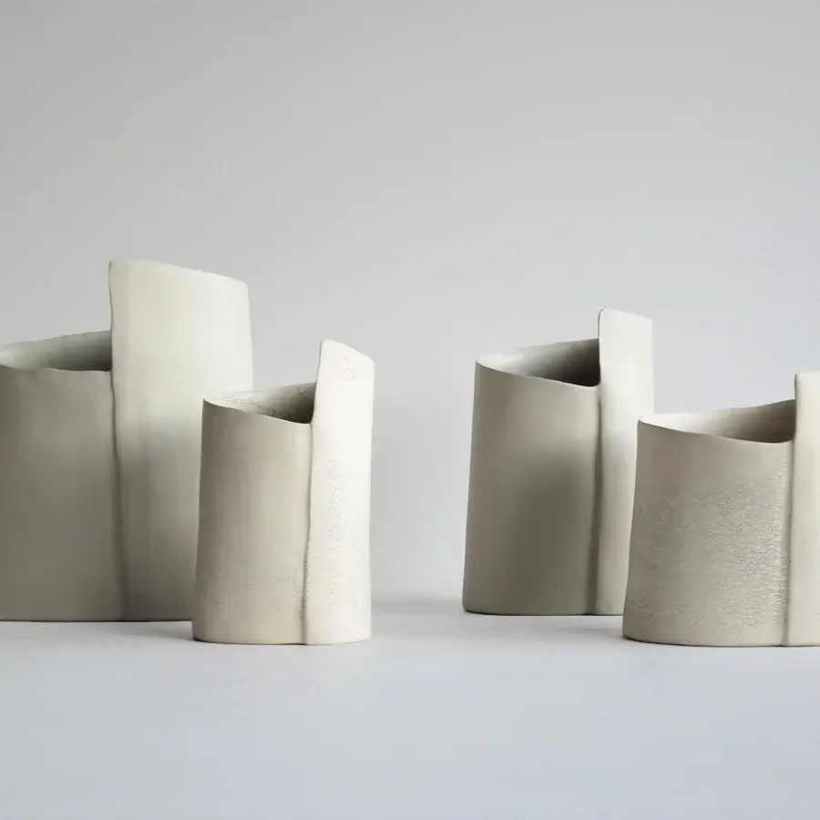 Exceptional Rina Menardi Torri vase crafted in baked clay with a pale hue and subtly textured matte finish