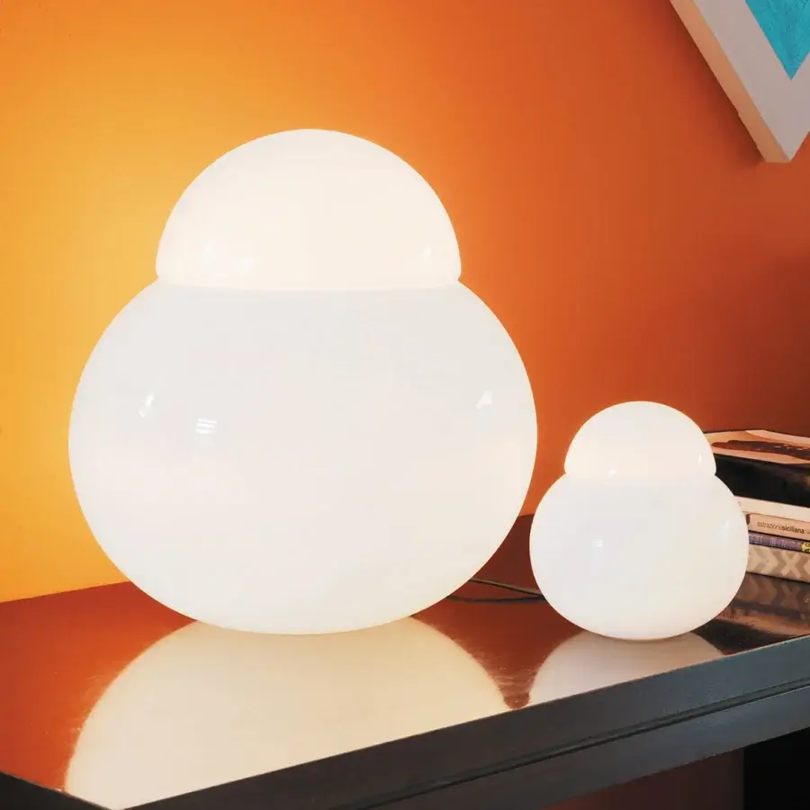 Elegant FontanaArte Daruma table lamp crafted in glossy white blown glass with overlapping volumes and a black power cable