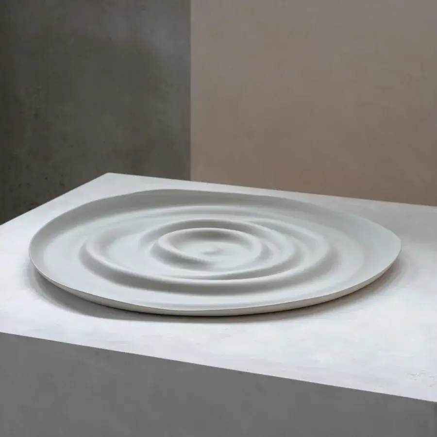Exceptional Rina Menardi Vortici centerpiece crafted in baked clay with undulating rings and a smooth matte finish