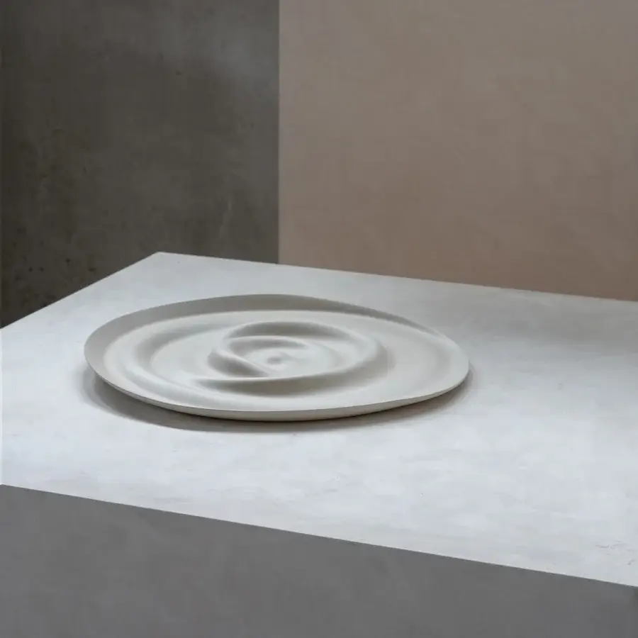 Superior Rina Menardi Vortici centerpiece crafted in baked clay with organic form and matte finish