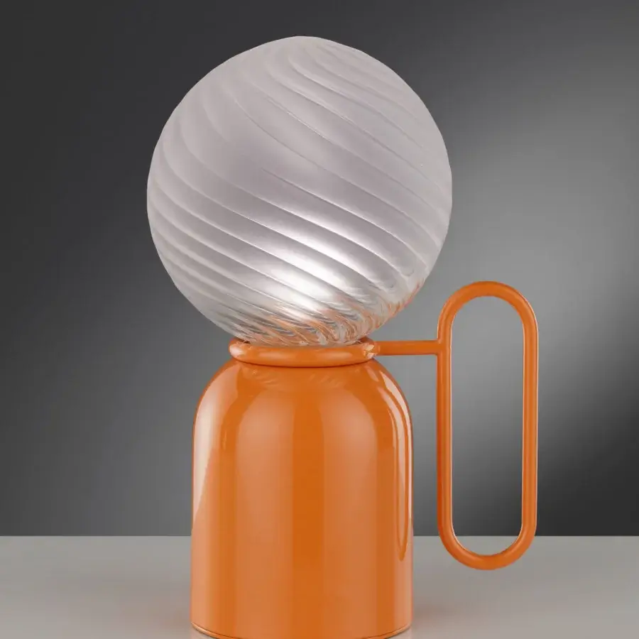 Exceptional Euroluce Atlas table lamp with vibrant orange glossy plastic and swirling translucent white shade crafted in Italy