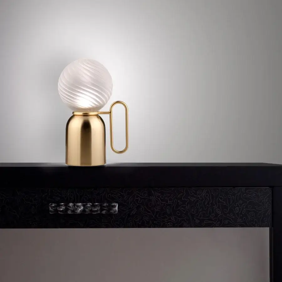 Distinguished Euroluce Atlas table lamp with satin brass-toned metal and frosted glass shade crafted in a contemporary design