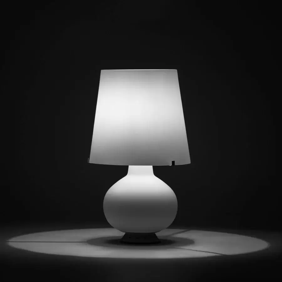 Exceptional FontanaArte Fontana 1853 lamp with neutral white synthetic material and elegantly curved lines offering adaptable illumination