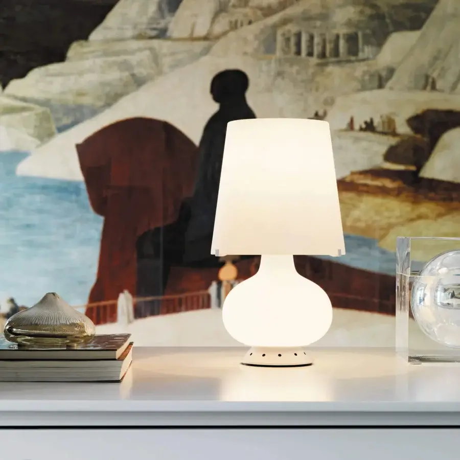 Elegant FontanaArte Fontana 1853 lamp in matte white translucent plastic with a sleek black base