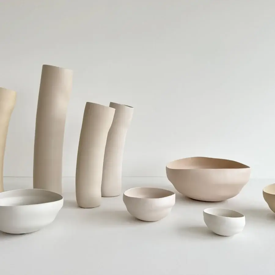 Distinguished Rina Menardi Wind vase sculpted from baked clay in a warm tan with a smooth matte finish