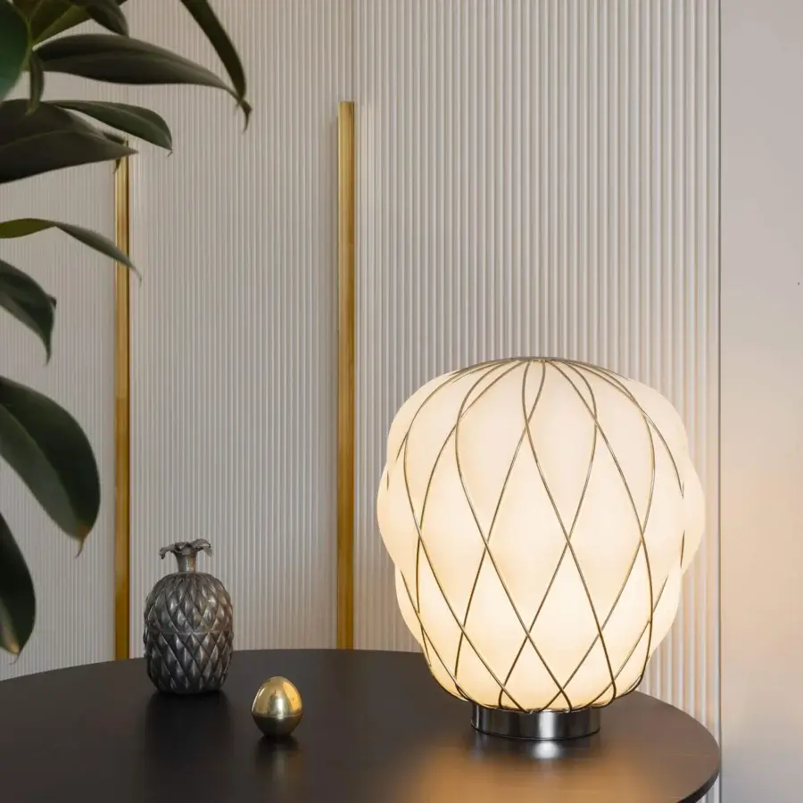 Elegant FontanaArte Pinecone table lamp crafted with translucent glass and glossy galvanic metal cage