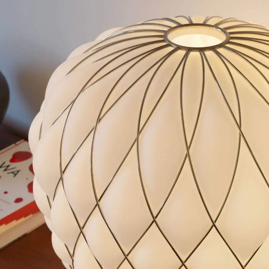 Exceptional FontanaArte Pinecone table lamp crafted with translucent off-white caged blown glass and glossy galvanic metal finish