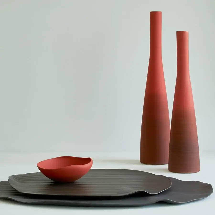 Exceptional Rina Menardi Solo vase crafted in baked clay with earthy terracotta and subtly textured matte finish