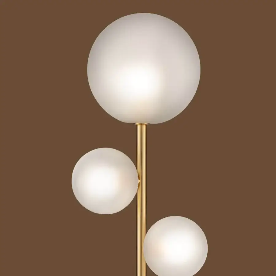 Elegant Euroluce Bubbles floor lamp with varying frosted glass shades in polished golden metal construction