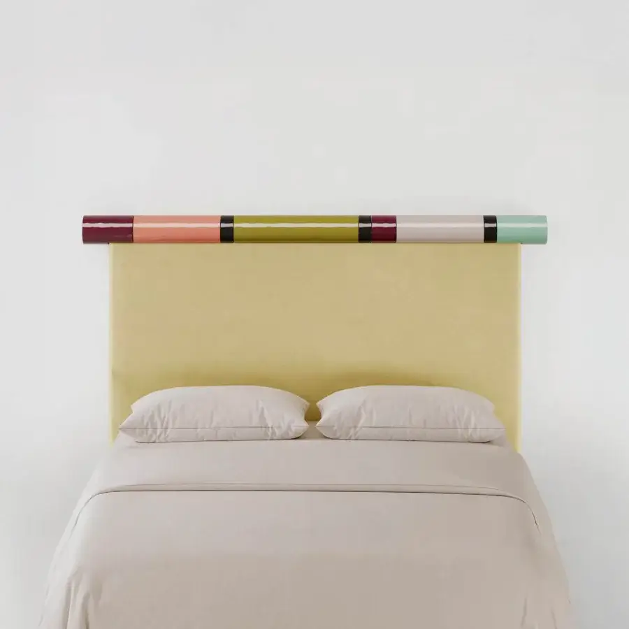 Exquisite Bolzan Letti Rosary headboard crafted with pale yellow velvet upholstery and cylindrical bands in burgundy, olive, pink, grey, teal hues