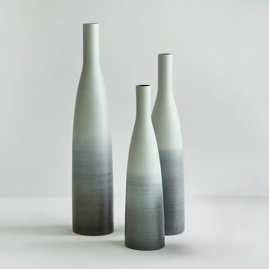 Distinguished Rina Menardi Bottiglie vase set in light gray-green baked clay with charcoal gradient and smooth matte finish