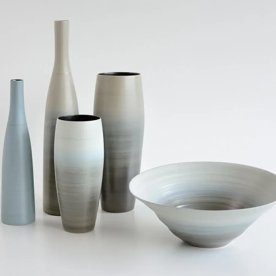 Distinguished Rina Menardi Bottiglie vase sculpted from baked clay in muted blue-gray tones with a satin finish
