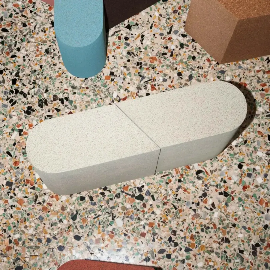Exceptional Bross Slice Modular Coffee Table with connected cork modules in a pale beige matte finish