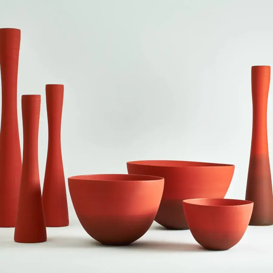 Exclusive Rina Menardi Flauti vase, a sculpted décor piece crafted in reddish-orange baked clay with a smooth matte finish