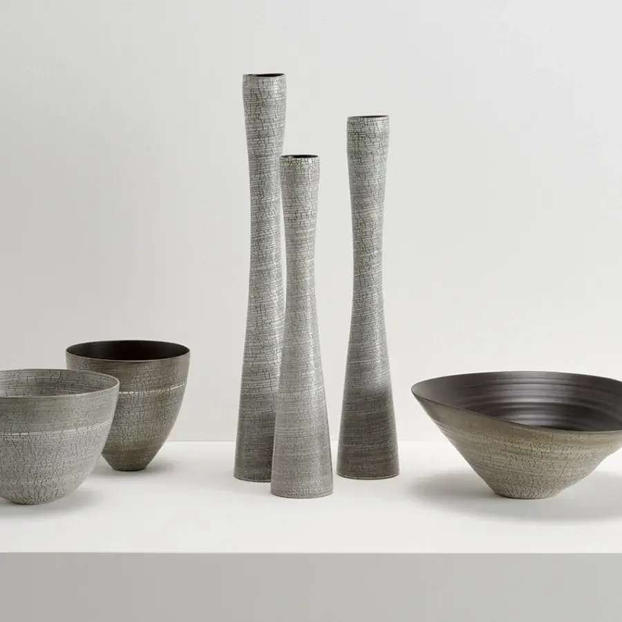 Distinguished Rina Menardi Flauti vase, a sculpted décor piece crafted in muted gray baked clay with a subtly textured matte finish