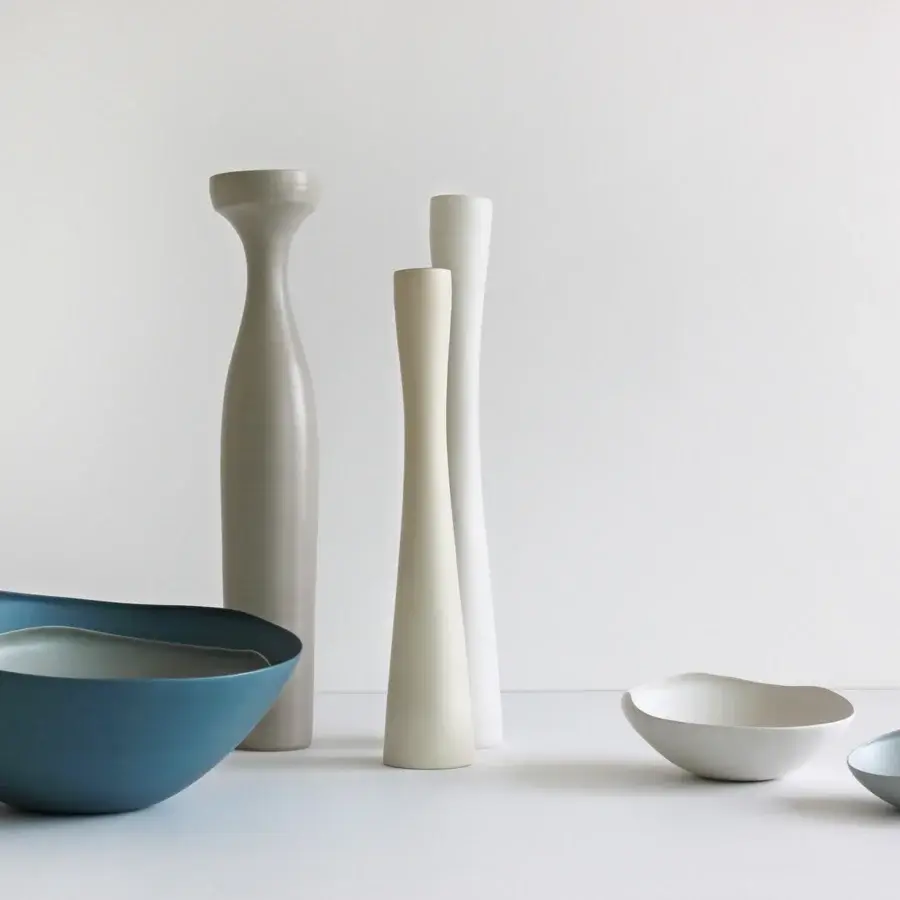 Distinguished Rina Menardi Flauti vase, a sculpted décor piece crafted in baked clay with a smooth matte teal blue finish
