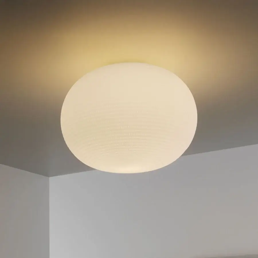 Exceptional FontanaArte Bianca lamp, a ceiling fixture with mouth-blown white glass and subtle grooves, boasting a silk effect finish