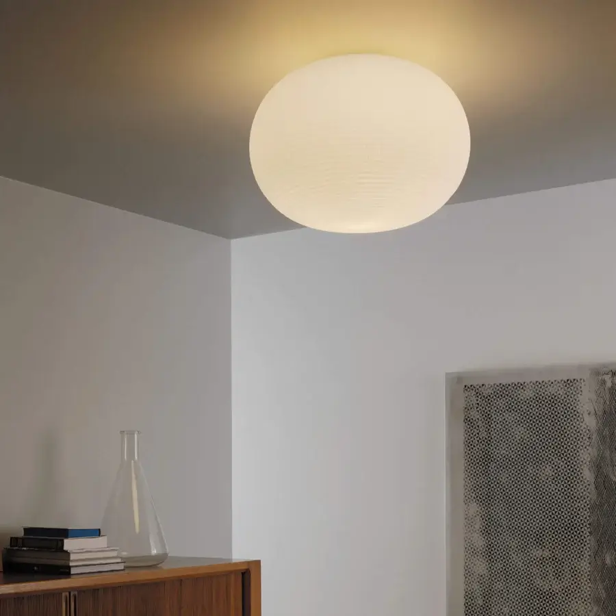 Distinguished FontanaArte Bianca lamp, a ceiling fixture crafted in mouth-blown glass with a warm white hue and matte finish