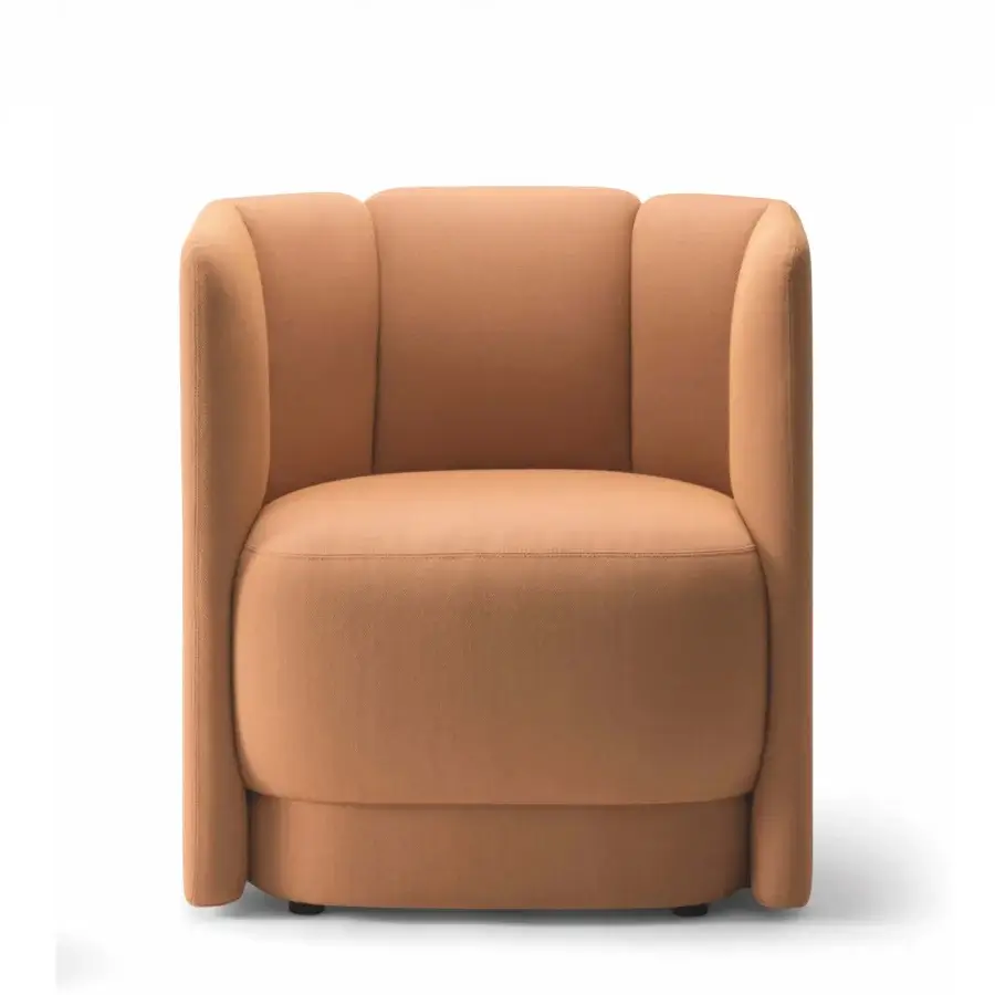 Exceptional Bross Velia lounge chair with comfortably sculpted form upholstered in warm terracotta textured fabric