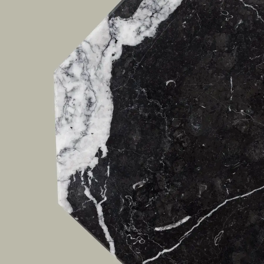 Distinguished Euroluce Castel table lamp in polished black marble with striking white veining and uniquely sculptural form