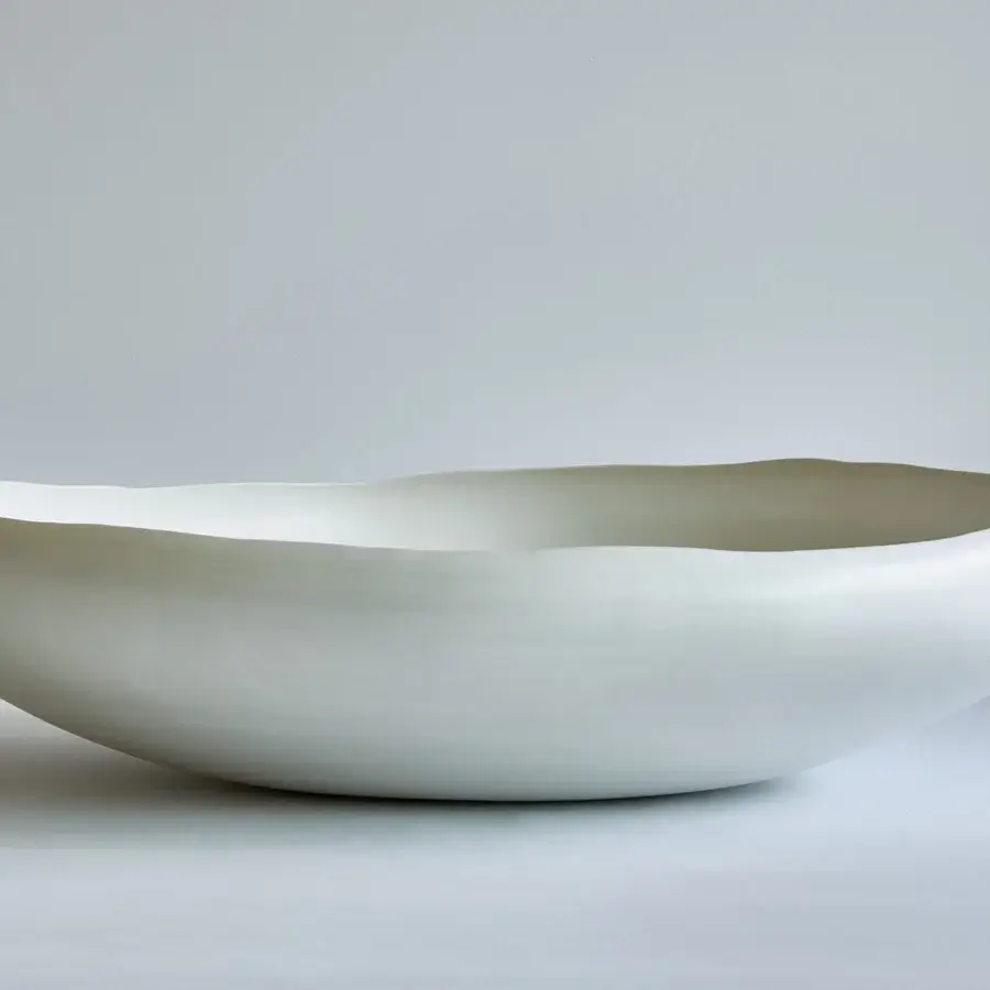 Distinguished Rina Menardi Laguna centerpiece crafted in baked clay with an undulating asymmetrical silhouette and matte finish