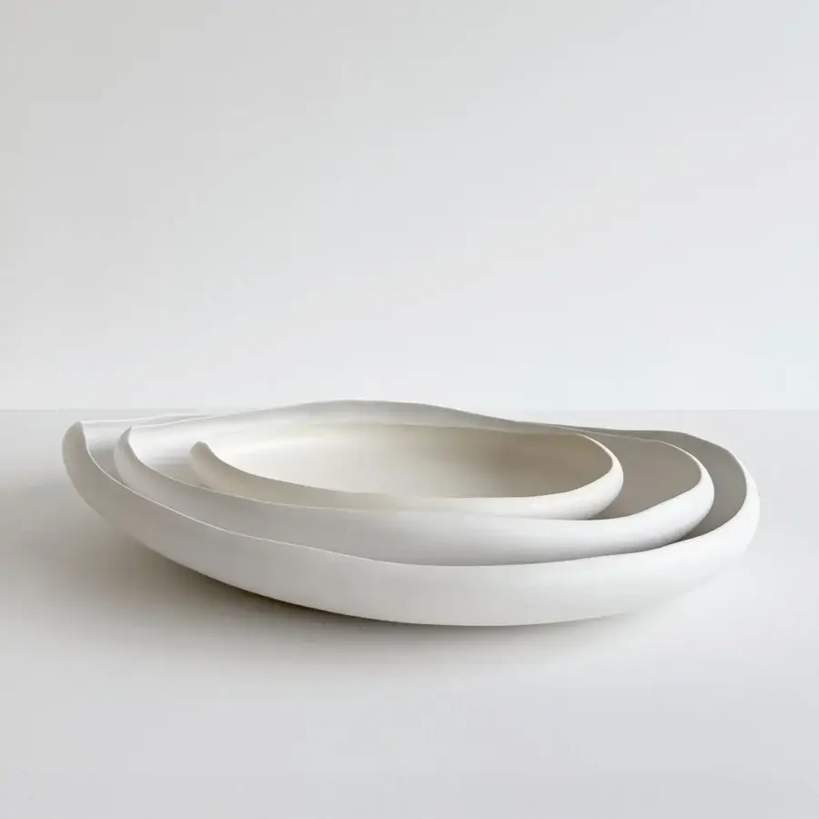 Exclusive Rina Menardi Laguna centerpiece crafted from baked clay in soft off-white with seamless matte finish