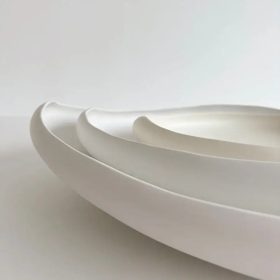 Exceptional Rina Menardi Laguna centerpiece crafted in baked clay with a satin sheen and pearlescent qualities