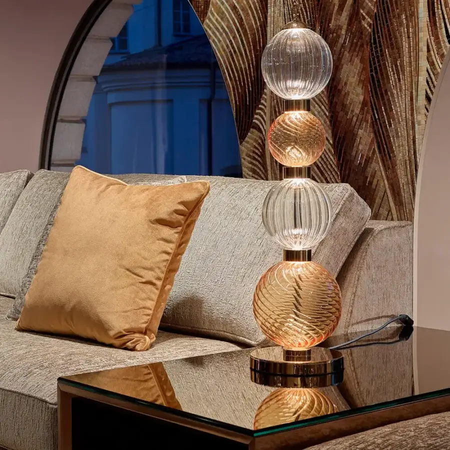 Exceptional Sicis Drop table lamp crafted in pyrex glass and satin-finished metal with warm amber clear glass composition
