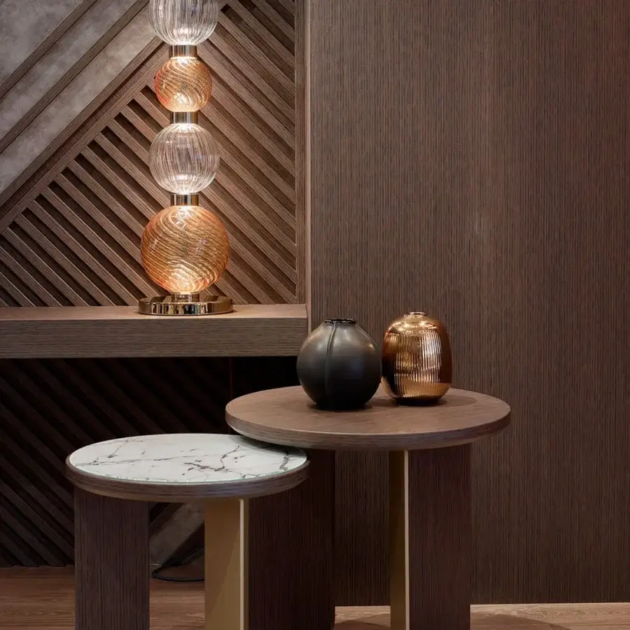 Distinguished Sicis Drop table lamp crafted in pyrex glass with satin-finished metal sections creating a contemporary glow