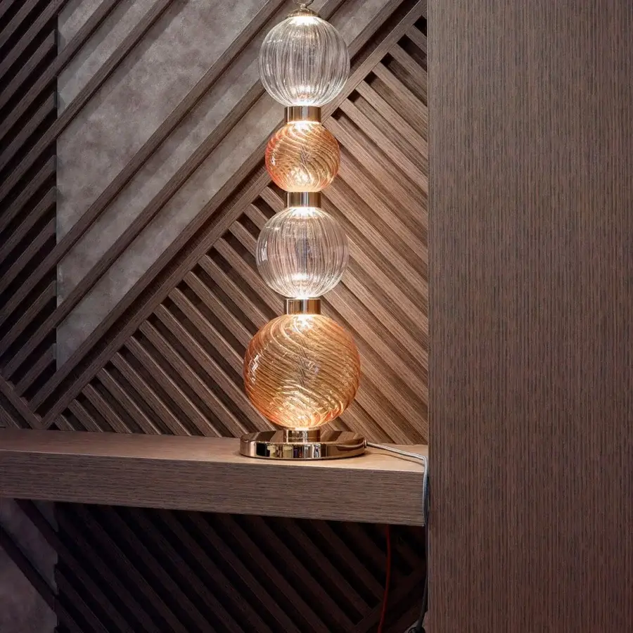 Superior Sicis Drop table lamp crafted in amber and clear pyrex glass with satin-finished metal frame