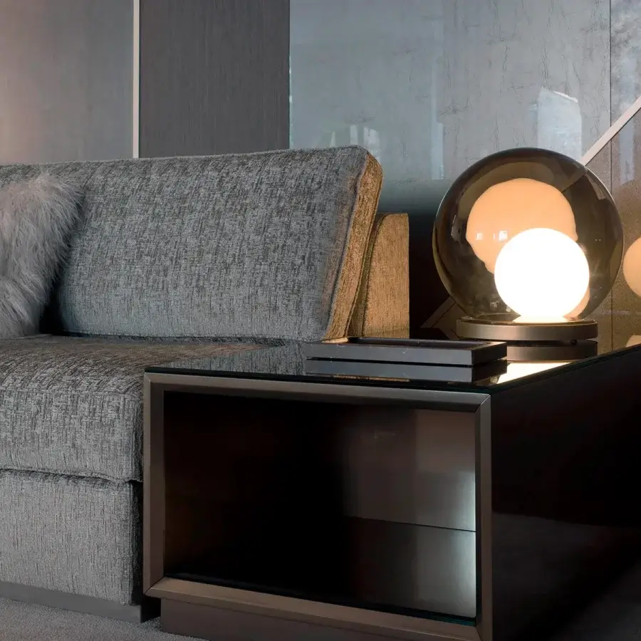 Superior Sicis Rigel table lamp with layered luminous blown glass in bronze opal and crisp white finishes with a dark brown wooden base