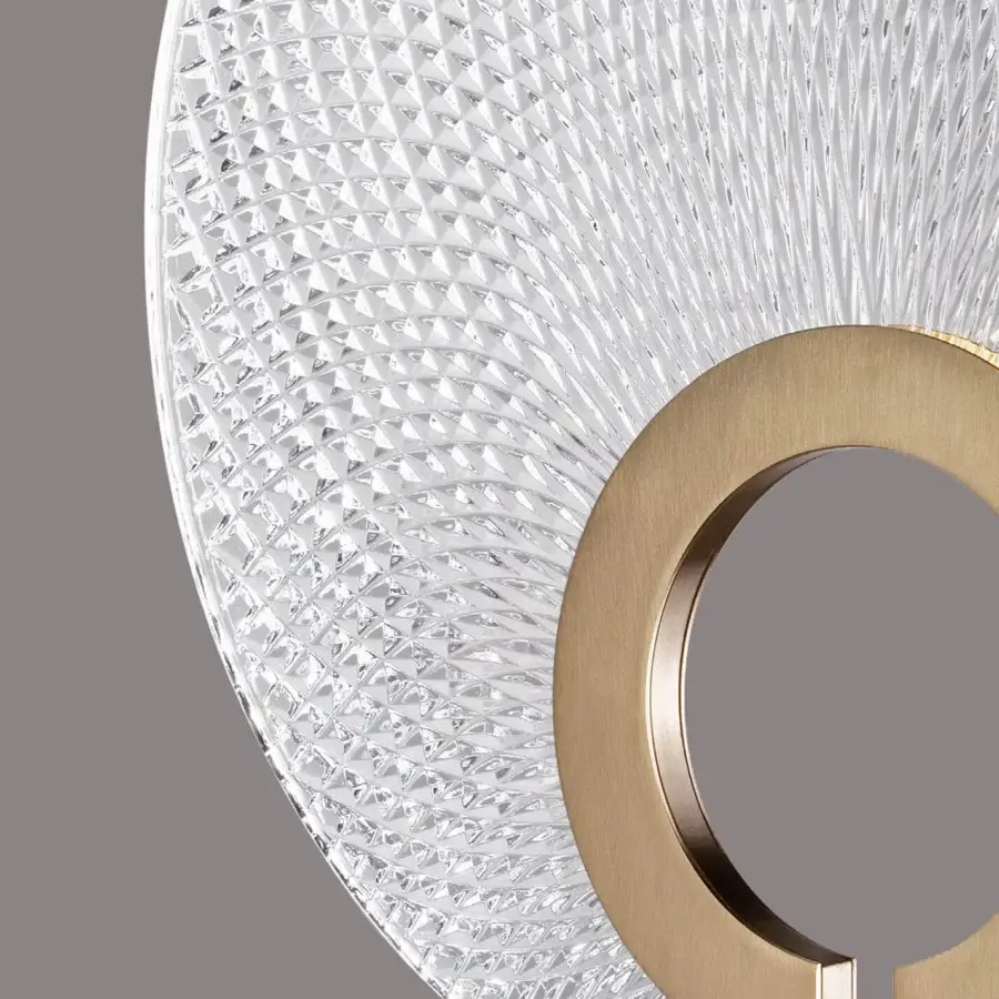 Superior Euroluce Corallo table lamp crafted in clear glass with golden metal and a deeply textured, faceted surface