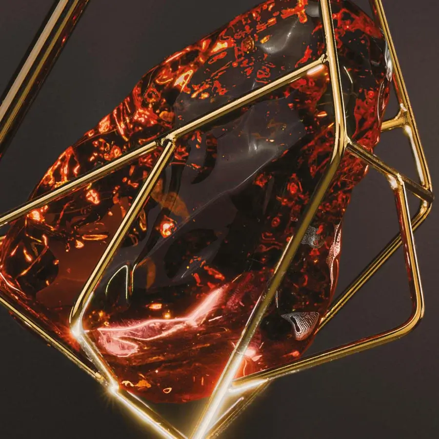 Exclusive Euroluce Cryrock suspension lamp with reddish-brown faceted crystal rock encased in polished golden-toned metal framework