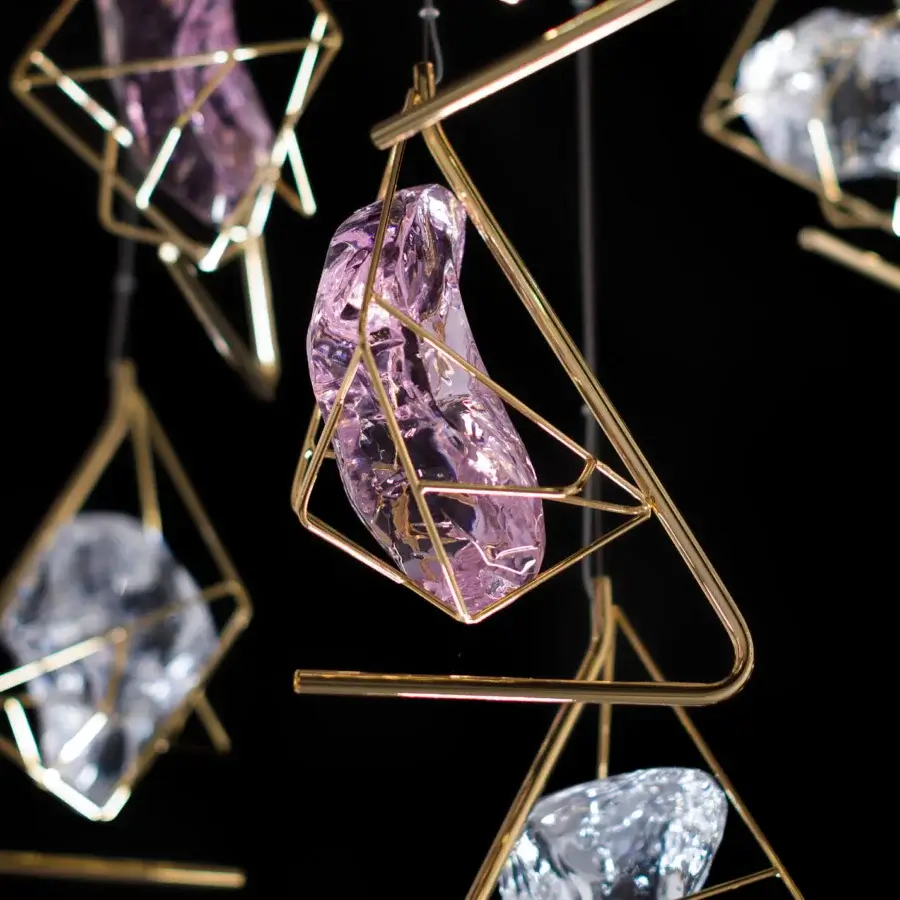 Exceptional Euroluce Cryrock suspension lamp crafted with clear to pale lavender crystal rock in gold-toned metal framework