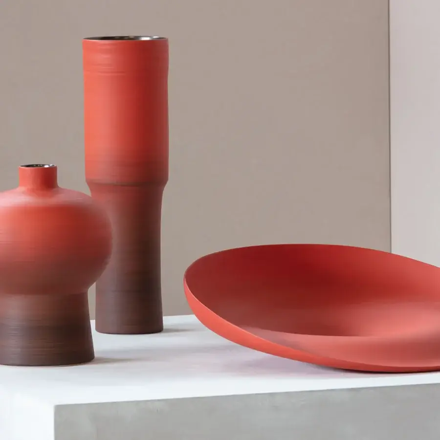 Exceptional Rina Menardi Royal vase crafted from baked clay in a textured matte terracotta with a subtle gradient