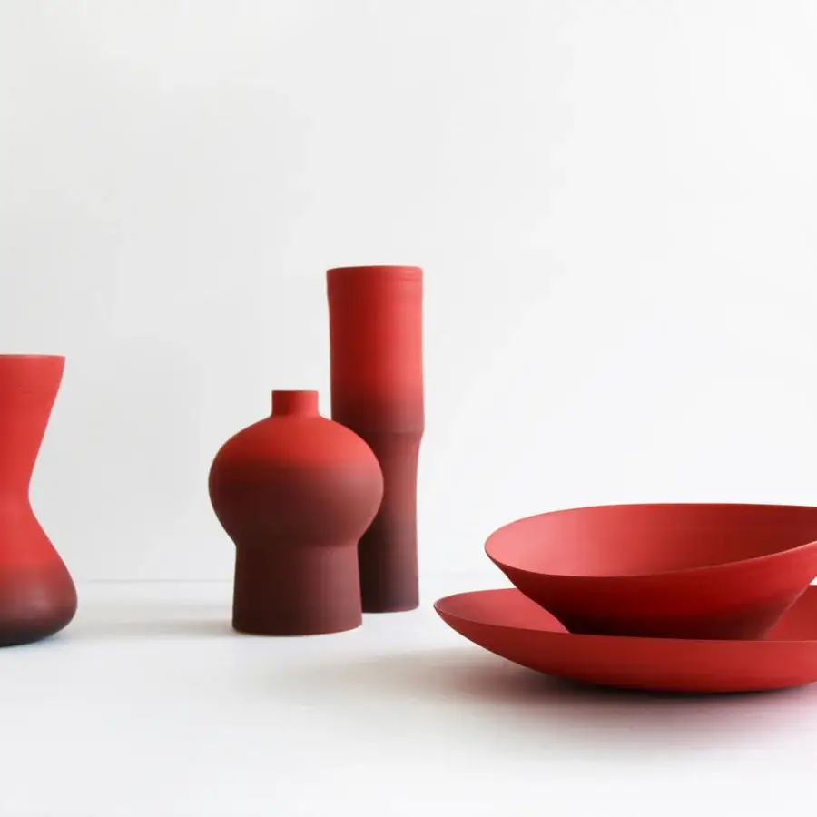 Superior Rina Menardi Royal vase crafted from baked clay with a subtly textured matte finish and reddish-brown gradient