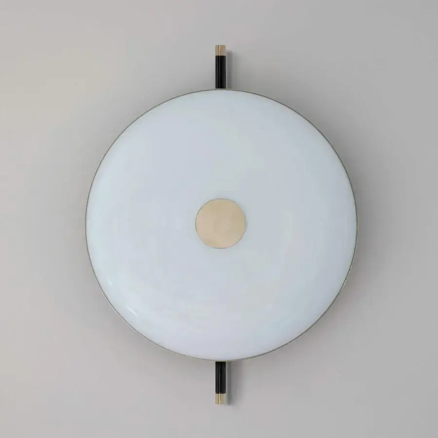 Elegant Sicis Amaretto wall lamp crafted in metal with polished black nickel and champagne finishes plus milky white blown glass