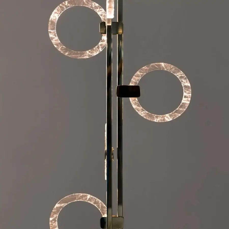 Distinguished Sicis Polo floor lamp crafted in champagne metal with transparent methacrylate light rings and architectural form