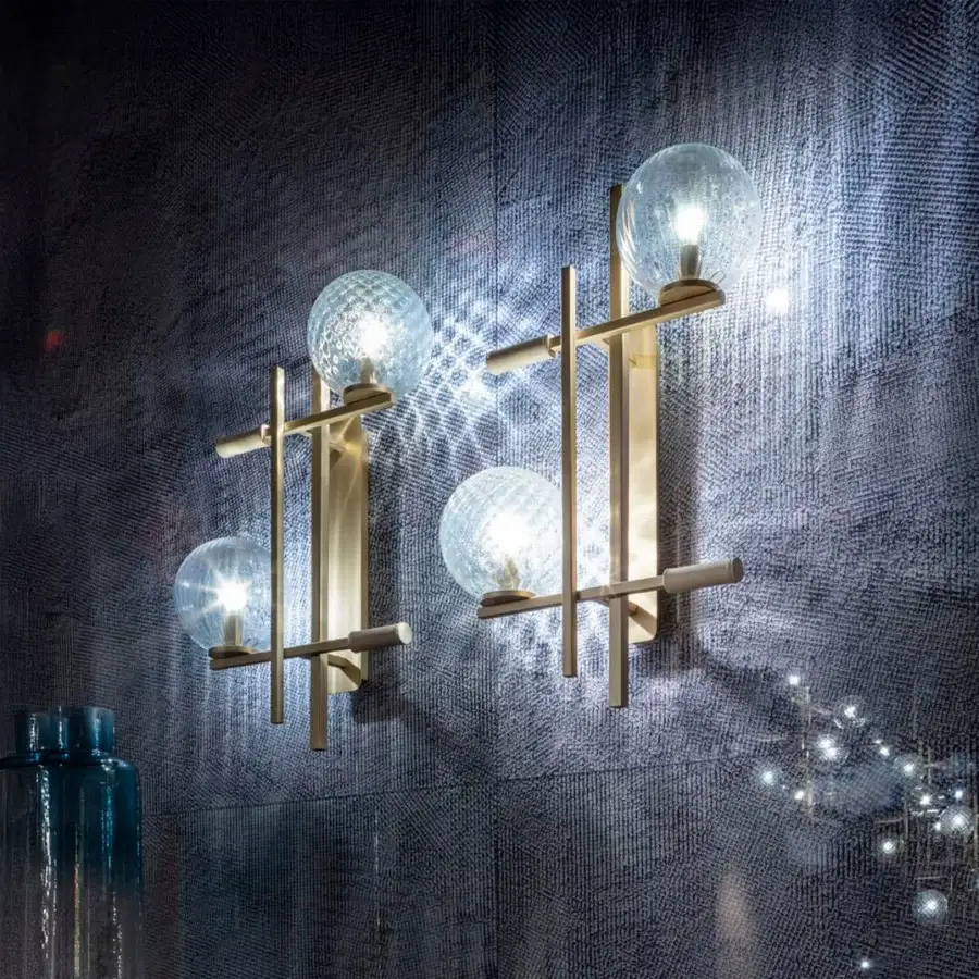Distinguished Sicis Tris Murano wall lamp crafted in champagne metal with hand-blown Murano glass spheres and subtle blue accents