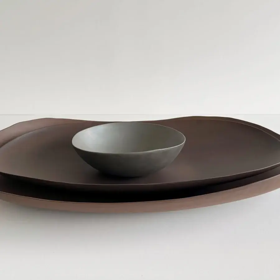 Exclusive Rina Menardi Petali centerpiece crafted in baked clay with a muted brownish-grey matte textured surface