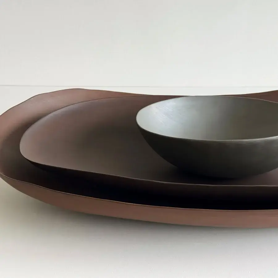 Distinguished Rina Menardi Petali centerpiece crafted in baked clay with reddish-brown hues and a predominantly matte satin finish