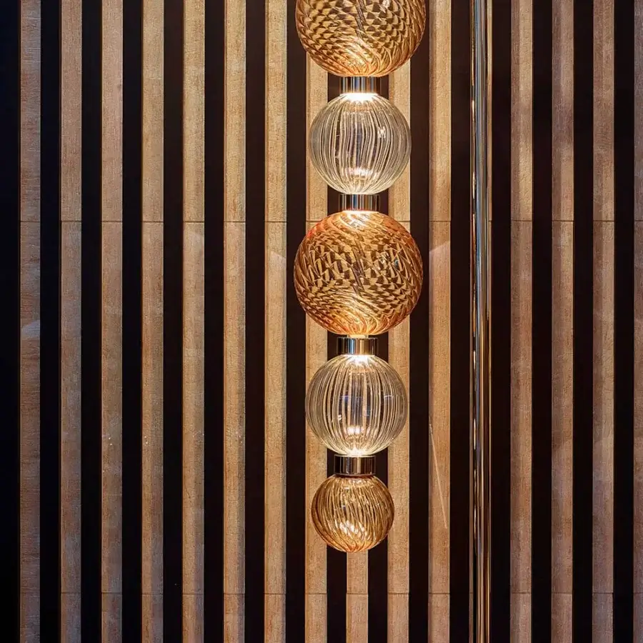 Superior Sicis Drop floor lamp crafted in Italy with satin metal and delicate amber pyrex glass spheres