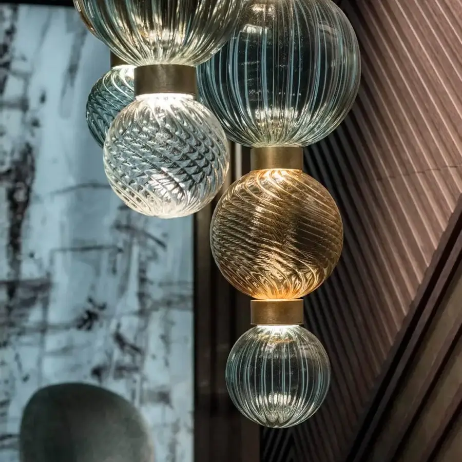 Superior Sicis Drop suspension lamp with cascading hand-blown Pyrex glass spheres in amber, clear, and gray with a satin metal frame