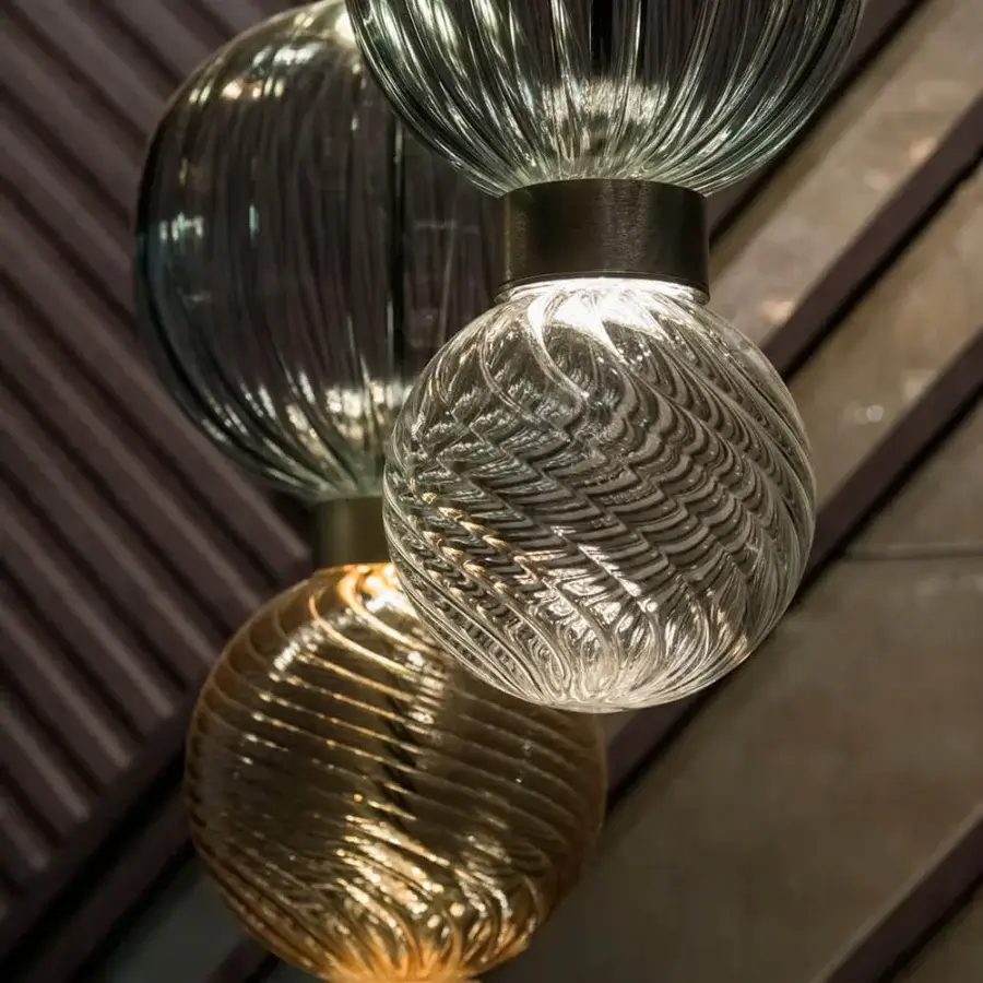 Distinguished Sicis Drop suspension lamp with translucent grey-green ribbed glass spheres and satin gold-toned metal frames