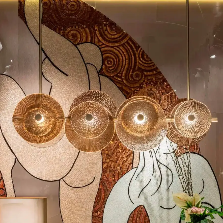 Lavish Sicis Andromeda chandelier crafted in brass with champagne finish and embellished bronzed smoky glass discs
