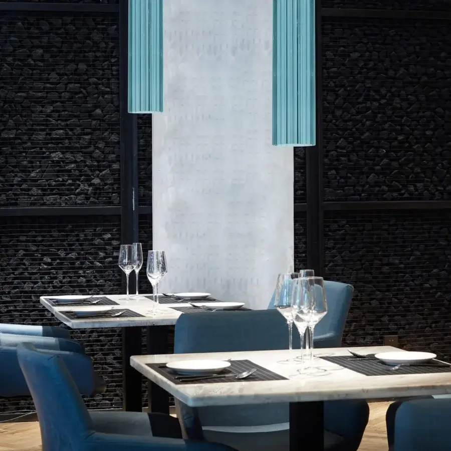 Superior Euroluce Itala suspension lamp crafted in textured blue glass with satin gold-toned metal accents