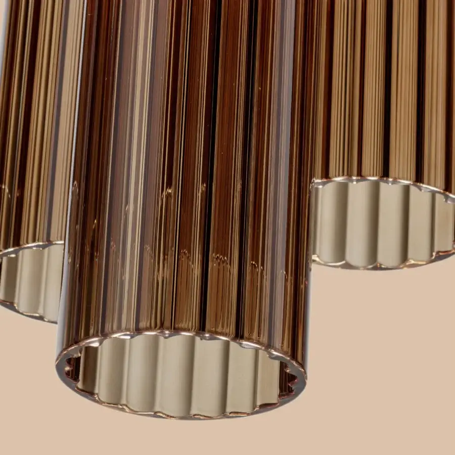 Superior Euroluce Itala suspension lamp crafted in warm amber glass with subtle ribbed detailing and light-colored metal support