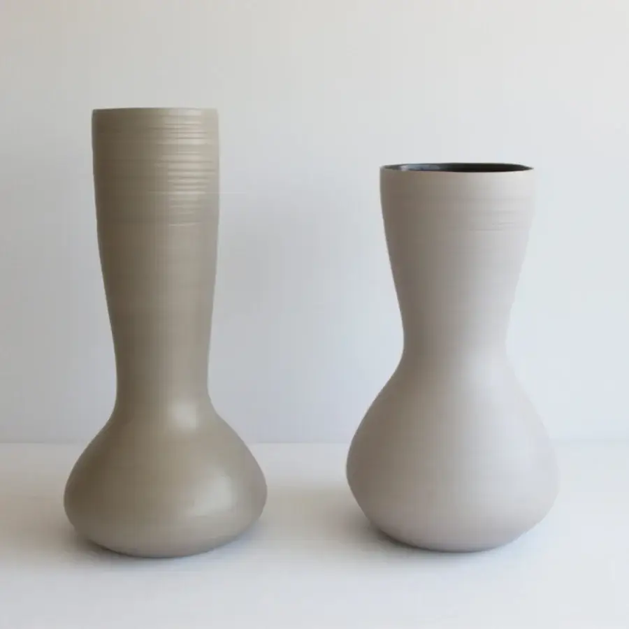 Exceptional Rina Menardi Venere & Zeus vases sculpted from baked clay with a smooth matte finish