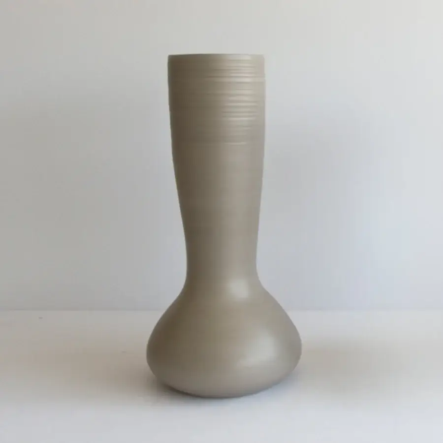 Distinguished Rina Menardi Venere & Zeus vase crafted in baked clay with a smooth matte finish and subtle ribbed detailing