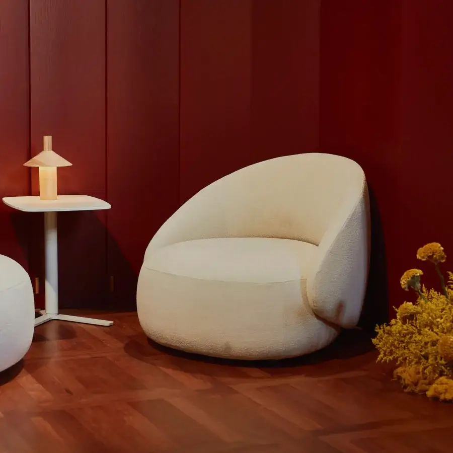 Lavish Lapalma Kipu Club lounge chair with an ergonomic backrest upholstered in creamy off-white textured bouclé weave skillfully made in Italy